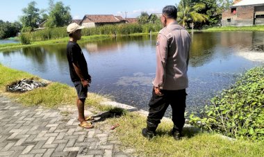 Bhabinkamtibmas-Bersama-Warga-Budidaya-Ikan